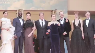 Led by president Vincent Lindon, the Cannes 2022 jury smiles ahead of the evening's closing ceremony