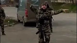 Chechen soldier performing folk “lezginka” dance in Mariupol.