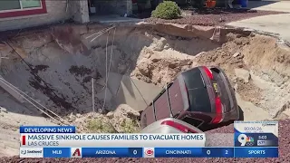 Las Cruces sinkhole engulfs 2 cars, displaces nearby families