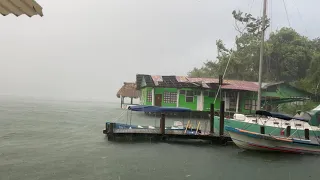 Crazy Storm Tears off Roof and blows tables into the Rio Dulce at Hotel Backpackers!!