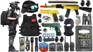 Special police weapon toy set unboxing, gold AK47 rifle, golden desert eagle, tactical helmet, bomb