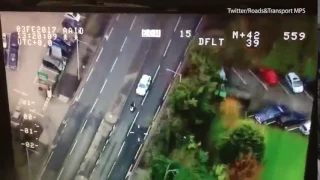 Moment police deliberately ram a stolen moped off the road
