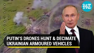 “Gone In Seconds…”: Russian Kamikaze Drones Hunt & Hammer Disguised Ukrainian Armoured Vehicles