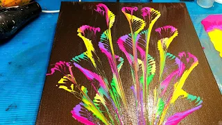 Drawing with beads on a string in an acrylic fill with liquid acrylic. Fluid art.