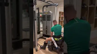 Conor Mcgregor doing pull-ups with a broken leg