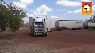 Massive road trains at roadhouses in outback Australia