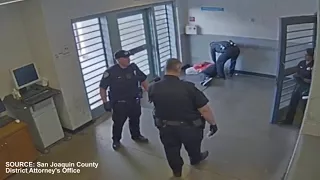 CAUGHT ON CAMERA: Corrections Officer Strikes Shackled Man In Spit Hood