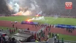 Malaysia-Saudi Arabia match stopped after flares thrown onto pitch