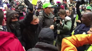 Police, protesters scuffle outside Trump inauguration