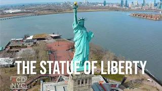 Flying High Above the Statue of Liberty: A Breathtaking Aerial View!