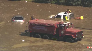 Air 11 captured video of men on truck being rescued from Houston flooding