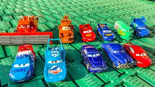 Pixar's: Cars On The Road | Lightning McQueen, Sally, Tow Mater, Doc Hudson, Mack Truck, Chick Hicks