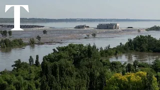 Drone footage shows aftermath of dam blast in Kherson region