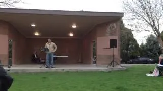 Pastor Loren Kolman delivers the sermon during the Easter Sunrise Service Sunday in Veterans Park.