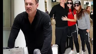 Julian McMahon jets into Sydney with wife and daughter