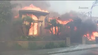 Firefighters continue to knock down Coastal Fire in Orange County as flames destroy 20+ homes