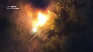 Ukrainian UAV footage showing artillery strikes on a russian military equipment in a forest