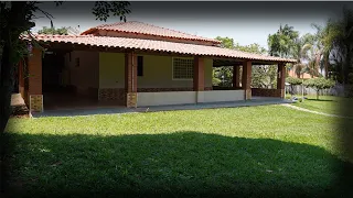 CHÁCARA COM ASFALTO NA PORTA /ÁREA DE 2.500M² /CASA /POÇO ARTESIANO /POMAR /MURADA /R$330.000,00