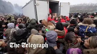 Tensions flare among migrants at Belarus-Poland border over aid supplies