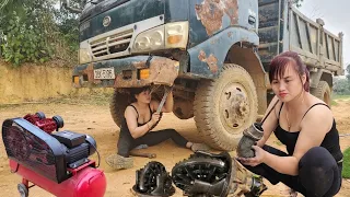 Genius girl repairs and maintains cars.