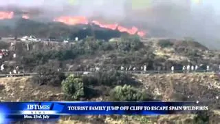 Tourist family jump off cliff to escape Spain wildfires