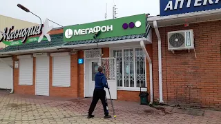 станица Мостовская клининг фасада салона Мегафон