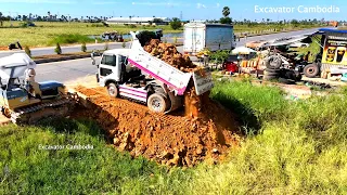 Amazing Action 5TON Truck Unloading Soil Stone Filling Up With D20P Komatsu Dozer Working Pushing