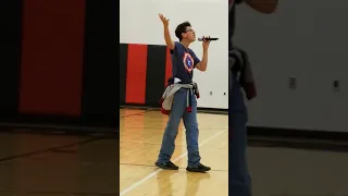 8th grader singing Riptide at middle school talent show
