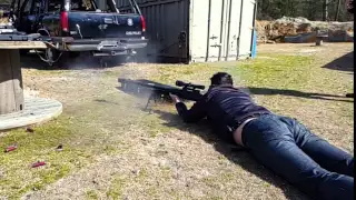 Firing a 50 Cal Sniper Rifle (Slo-mo)