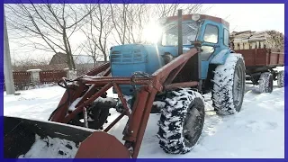 Russian tractor work in the winter
