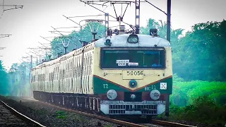 Conventional 12 Coach Electric Multiple Unit Train of Eastern Railways running through greeny nature