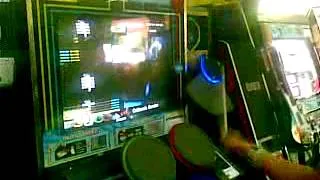 Guy playing chatharis garden in drummania v6