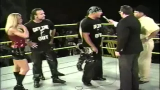 Jim Ross is confronted by The Revolution