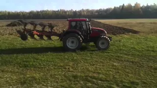 Valtra n121+kverneland ES 80 ploughing