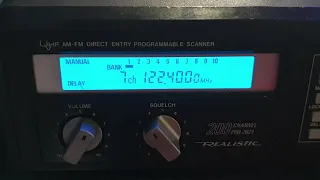 Realistic Pro2021 scanner with squealing audio.