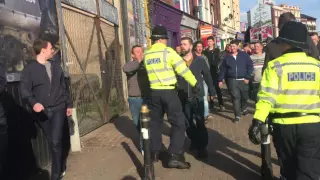 Police headbuts football fan