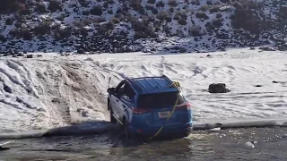 2018 RAV4 AWD: Driving through a Creek/ Snow Test Stock
