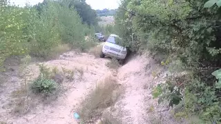 Cute asian girl four-wheeling with Land Rover Discovery 4