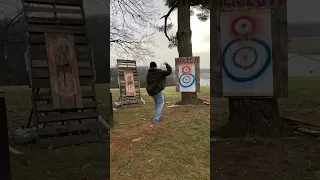 Throwing axes with both hands!