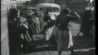 Civilians of Teruel, Spain watch as bombs fall (1938)