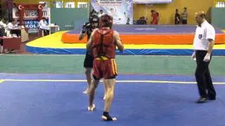 75 kg Yavuz Selim Kazancı (red side) - knockout scene-sanshou wushu .MPG