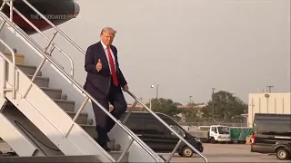 Trump arrives in Georgia to surrender on election interference charges