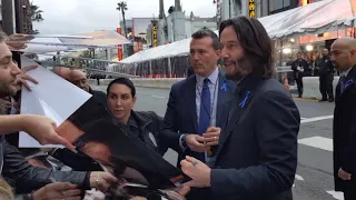 Keanu Reeves loves his fans - Hollywood Movie premiere -  John Wick premiere Los Angeles