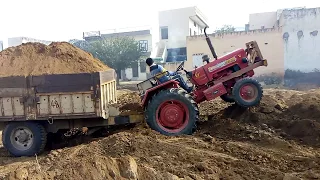 Mahindra 265 stuck in soil with trolly
