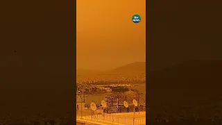 Skies over southern Greece turned orange as dust clouds from North Africa engulfed Athens.