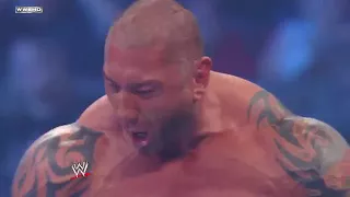 Batista try to attack undertaker and rey mysterio