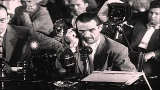 Howard Robard Hughes is questioned during the investigation of 40 million in war ...HD Stock Footage