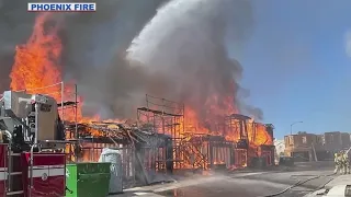 Homes under construction in North Phoenix go up in flames