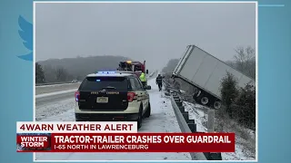 Tractor-trailer crashes over guard rail on I-65 in Maury County