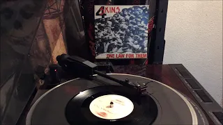 SIDE ONE 7 INCH presents The 4 Skins - One Law For Them 1981